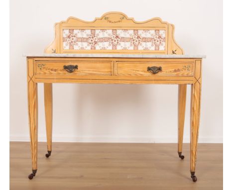 A REGENCY STYLE PAINTED WASH STANDthe marble top with a shaped and tile inset gallery, over two frieze drawers,  on tapered b