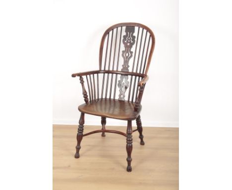 AN ELM AND YEW WOOD WINDSOR ARMCHAIR, POSSIBLY NOTTINGHAMlate 18th/early 19th century, with pierced and carved central back s