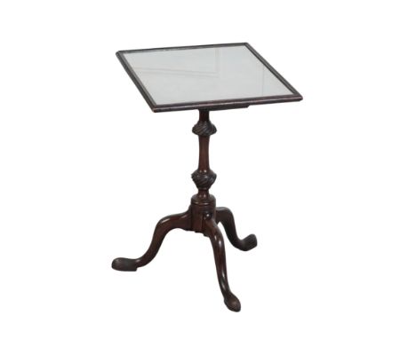 A GEORGE III MAHOGANY PEDESTAL TABLE18th century but converted from a firescreen, the rectangular top inset with a needlework