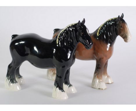 TWO BESWICK POTTERY MODELS OF SHIRE HORSES, black and brown gloss, 8 1/2" (21.6cm) high, the brown horse with printed mark (2