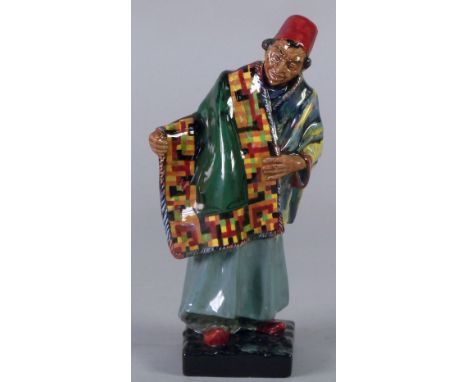 ROYAL DOULTON CHINA FIGURE  'Carpet Seller' HN 1464, 9" (22.9cm) high, printed mark 