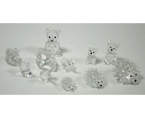 ELEVEN SWAROVSKI CUT GLASS MODELS OF ANIMALS, graduated set of three seated Bears, graduated set of three Hedgehogs, graduate