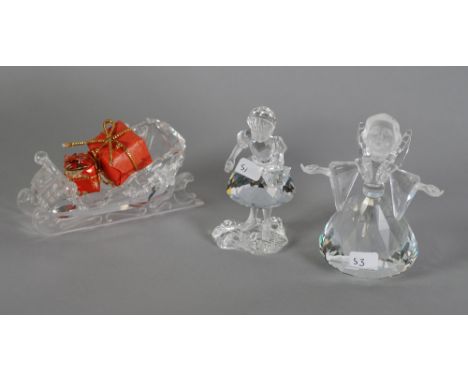 THREE SWAROVSKI CUT AND FROSTED GLASS MODELS, 'Sleigh' 4 1/4" (10.8cm) long, 'Angel' 3 3/4" (9.5cm) high and 'Little Red Ridi