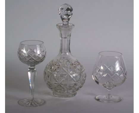 SET OF EIGHT CUT GLASS HOCK GLASSES, 7 1/4" (18.4cm) high, TOGETHER with a SET OF SIX CUT GLASS BRANDY BALLOONS, 5" (14.6cm) 