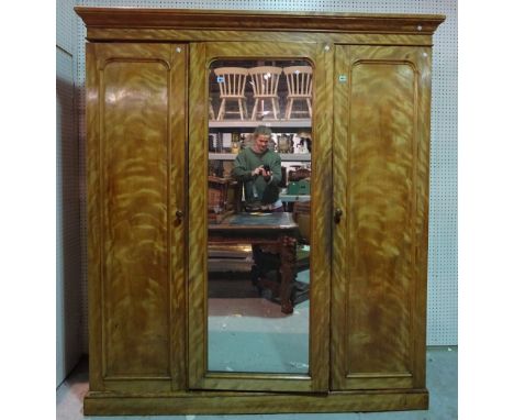 A Victorian satin birch compactum wardrobe with centre mirrored door, 188cm wide x 209cm high. 