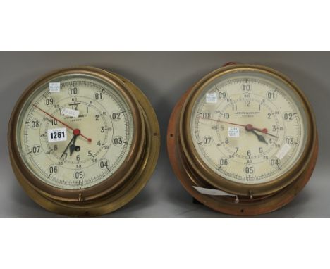 A circular brass cased wall clock by John Garnett London, with 7.5inch tin dial and single train movement and a matching bras