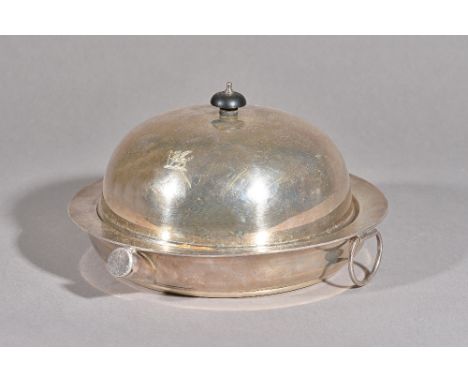 An early 20th century silver muffin dish with Argyle warmer base of good gauge, Charles Boyton &amp; Sons, London 1922, turne