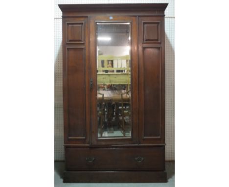 A Regency style mahogany single mirrored door wardrobe, 130cm wide x 190cm high.