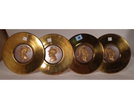 Two pairs of gilt metal curtain tie-banks, modern, each centred with a relief cast busy of a Grecian warrior, 20cm diameter. 