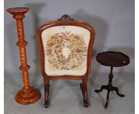 A Victorian mahogany framed arch top tapestry screen, 57cm wide x 94cm high, a 20th century oak jardiniere stand with barley 