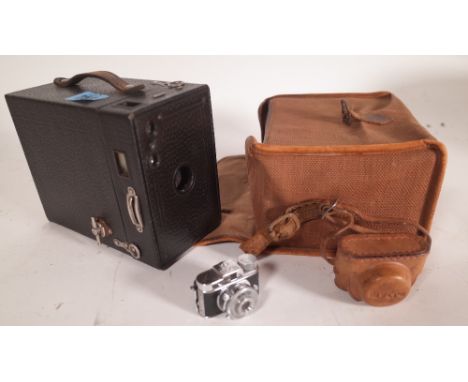 A Kodak Brownie camera and a miniature micro camera, (2). 