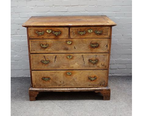 A George I crossbanded walnut chest of two short and three long graduated drawers, on bracket feet, 100cm wide x 94cm high.