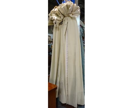 Two pairs of lined and interlined cream curtains each 110cm wide x 200cm drop, with four tie backs. 