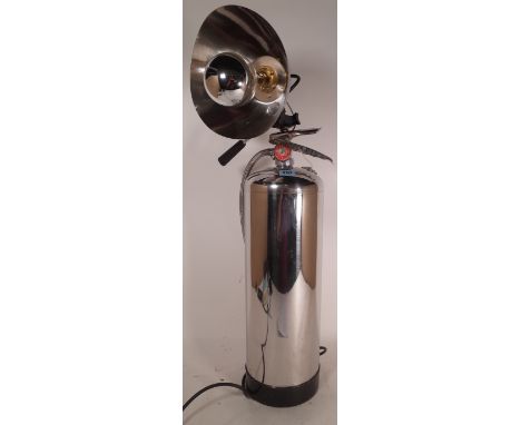 A 20th century chrome plated fire extinguisher converted to a lamp, 120cm high. 