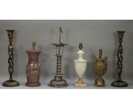 A pair of Kashmiri foliate painted wooden candlesticks with open barley twist stems, 51cm high, a silver plated candlestick t