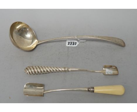 A George III silver ladle in the feather edge pattern, Peter and Ann Bateman, London 1813, 33.5cms long, 150g.; an ivory hand