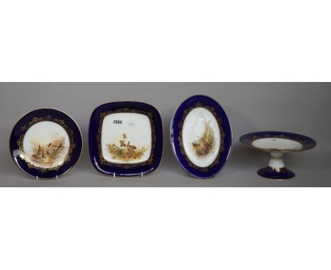 A Royal Worcester porcelain dessert service, circa 1912 and later, hand painted with wild fowl, signed 'Austin' and 'Shuck' c