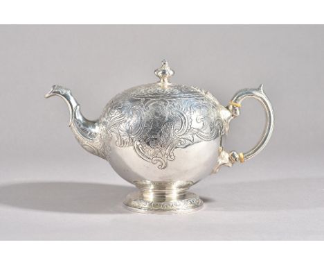 A late Victorian silver teapot, of spherical form, decorated with mythological figures, flowers and scrolls in the 18th centu