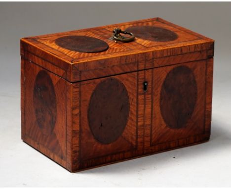 A George III satinwood and yew wood rectangular tea caddy, with twin compartment interior, 20cm wide x 13cm high. 