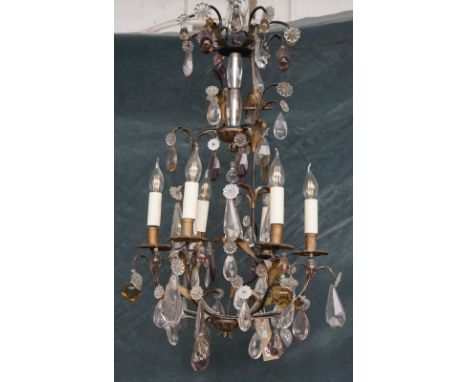 A modern six branch gilt metal and glass chandelier of open form with foliate moulded glass leaves and coloured drops, 78cm h