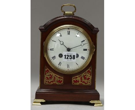 An Edwardian mahogany cased mantel clock, George III style, with domed top, enamelled dial and a French two train movement, 2