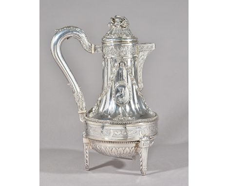 A German silver coffee pot, the body of swept form, decorated with oval portraits, foliate swags and with bold fluting above 