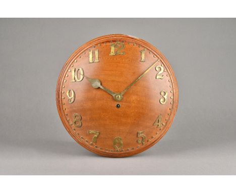 An Arts &amp; Crafts mahogany circular wall clock in the Liberty style , mid-20th century, of convex form with applied gilt m