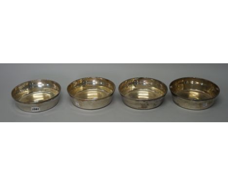 Assorted silver plate including; a set of four pedestal vases; a circular entrée dish and cover; A mahogany cased set of 18 p