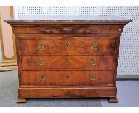 A French Directoire commode, the marble top over a walnut base of five long graduated drawers, 128cm wide x 98cm high. 