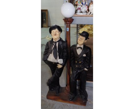 Laurel &amp; Hardy, a 20th century resin figural standard lamp, 114cm high. 