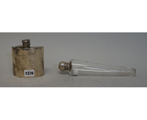 A George V silver hip flask, of curved rectangular form, with hinged bayonet fitted cap, London 1912, and a Victorian silver 