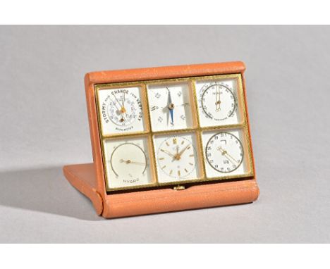 A vintage Angelus sixsome eight day desk top clock compendium comprising; barometer, compass, thermometer, Hygro, clock and c