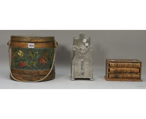 A Shaker bentwood box and cover, 19th century with foliate painted decoration, 24cm high, a pewter and glass table top barome