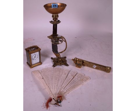 Collectables, including; candlesticks made with elements from a 19th century sword, a carriage clock, brass box and a fan, (q