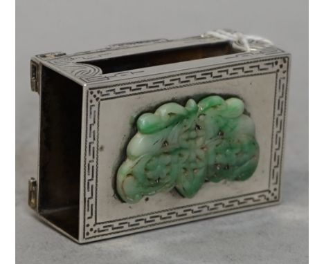 A silver matchbook slide, of rectangular form, the cover applied with a jadeite plaque, otherwise with engraved decoration, r