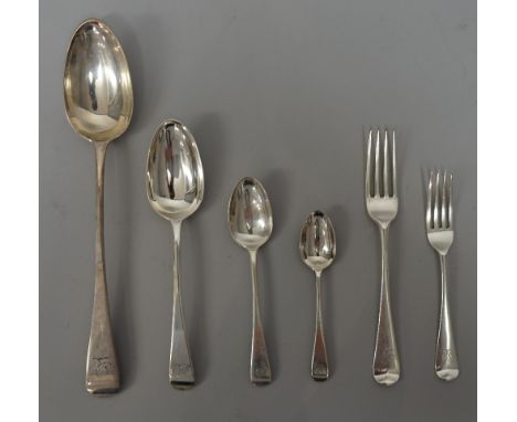 Victorian silver Old English pattern table flatware, comprising; a stuffing spoon, five tablespoons, nine table forks, four d