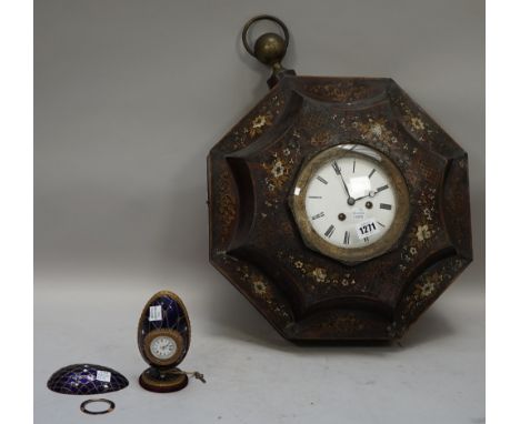 A mid-19th French simulated tortoiseshell and Tôle Peinte octagonal striking sedan clock, painted with flowers and a white gl