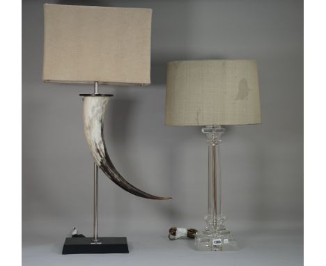 A modern Perspex table lamp of column form on a square foot and one further modern faux horn table lamp, both with shade, the