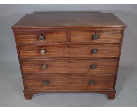 A George III mahogany chest of two short and three long graduated drawers on bracket feet, 110cm wide x 92cm high. 