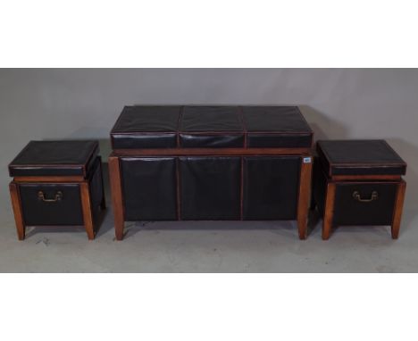 A 20th century hardwood framed and faux black leather upholstered trunk, 90cm x 55cm high and two smaller matching trunks, ea