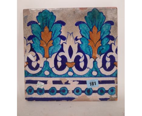 An underglaze painted pottery tile, probably Sindh, 19th century, decorated with repeated palmette motifs, 25cm.square.  