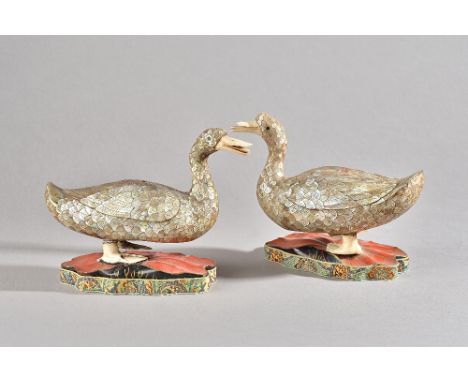 A pair of 19th century Chinese mother-of-pearl and ivory duck form box and covers, each with a small disguised cover inscribe