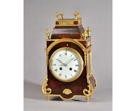A French brass and tortoiseshell mounted eight day mantel clock, late 19th century, with white enamel dial and a two train mo