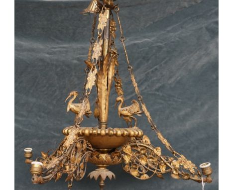 A French gilt metal four branch chandelier, the central pole cast with bullrushes over a bowl surrounded by three herons, iss