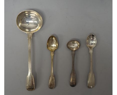 A group of silver fiddle and thread pattern table flatware, comprising; three sauce ladles, four salt spoons and nine egg spo