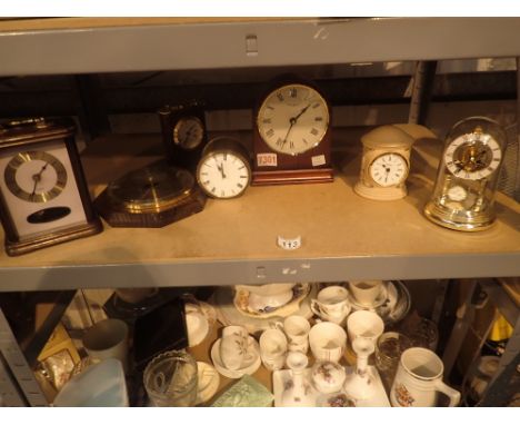 Six mantel clocks and barometers