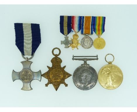 A W.W.1 DSC group of four medals, awarded to Major H. G. Travers. R.A.F., comprising Distinguished Service Cross; 1914 Star t