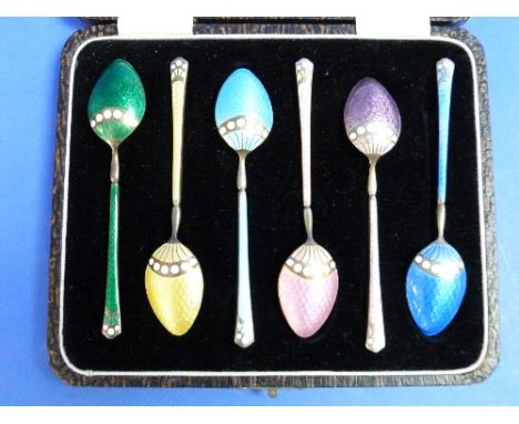 A stylish cased set of six George V silver gilt and enamel Tea Spoons, by Turner & Simpson, 1930, all with differing coloured