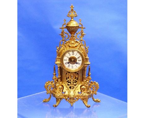 An 19thC French brass mantel Clock, with 8-day movement striking on a bell, signed Michelant A Paris, the ornate pierced and 
