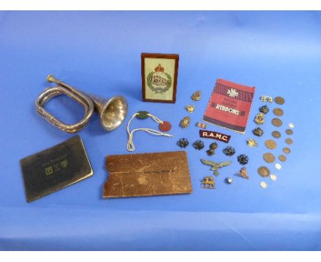 A quantity of Militaria, including British helmet, bugle, medals, literature, torch, silver-topped cane, etc (a lot)